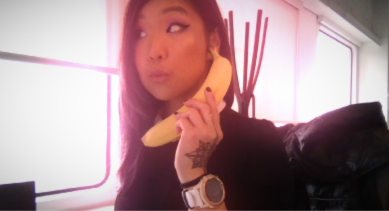 Product Designer Victoria Lo holding a banana like a phone